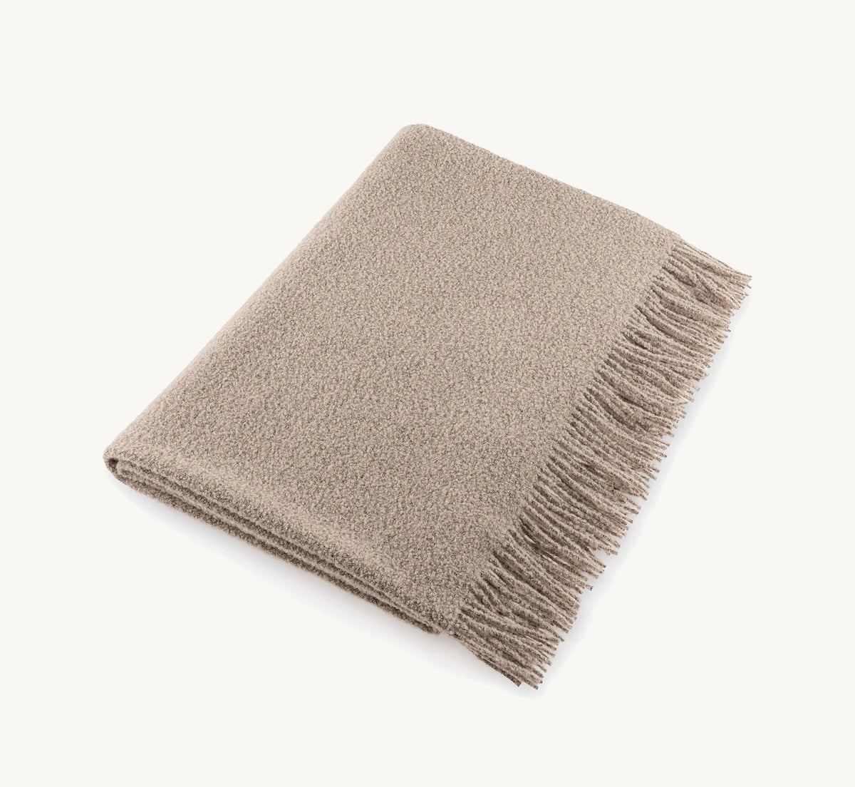 Buccola – couverture en laine bouclée beige Cacao pliée – Maison Canisya