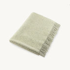 Buccola – couverture en laine bouclée vert clair Fleur de sureau pliée – Maison Canisya