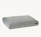 Coussin Senso MiaCara en bouclé coloris pebble, vue trois quarts produit – Maison Canisya