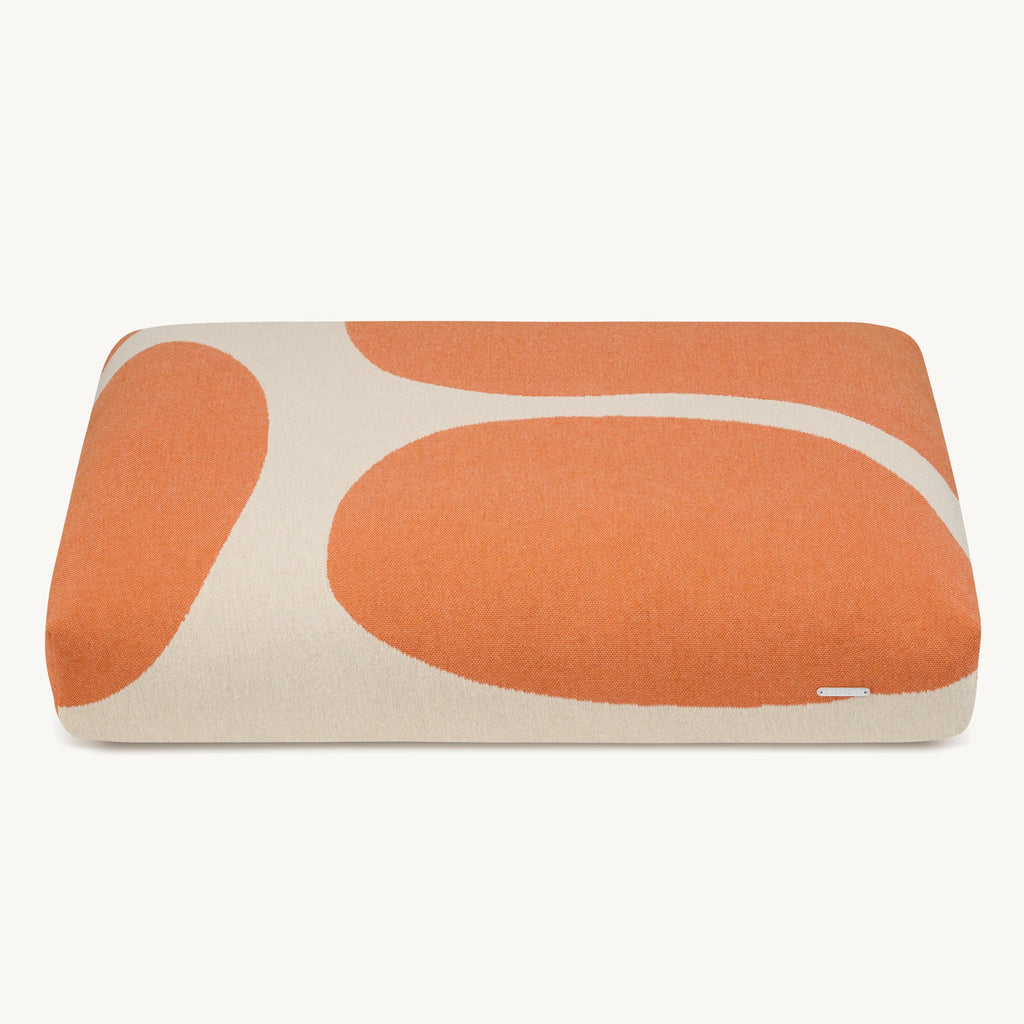 Coussin Stone – vue produit détourée, coloris orange à motifs beige – Maison Canisya