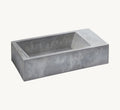 Gamelle Trogolo en béton anthracite vue de trois quarts, fond neutre – Maison Canisya