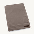 Housse coussin chien Mondo chocolat — housse pliée vue produit fond neutre — Maison Canisya