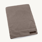 Housse coussin chien Mondo chocolat — housse pliée vue produit fond neutre — Maison Canisya