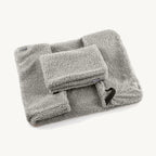 Housse panier coffre Senso MiaCara coloris pebble pliée sur fond studio neutre — Maison Canisya