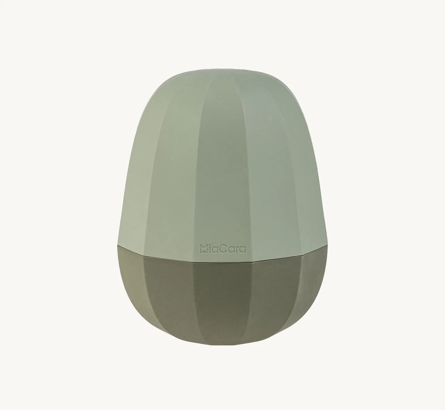 Uovo jouet d éveil coloris Grolive sur fond neutre vue de côté — Maison Canisya